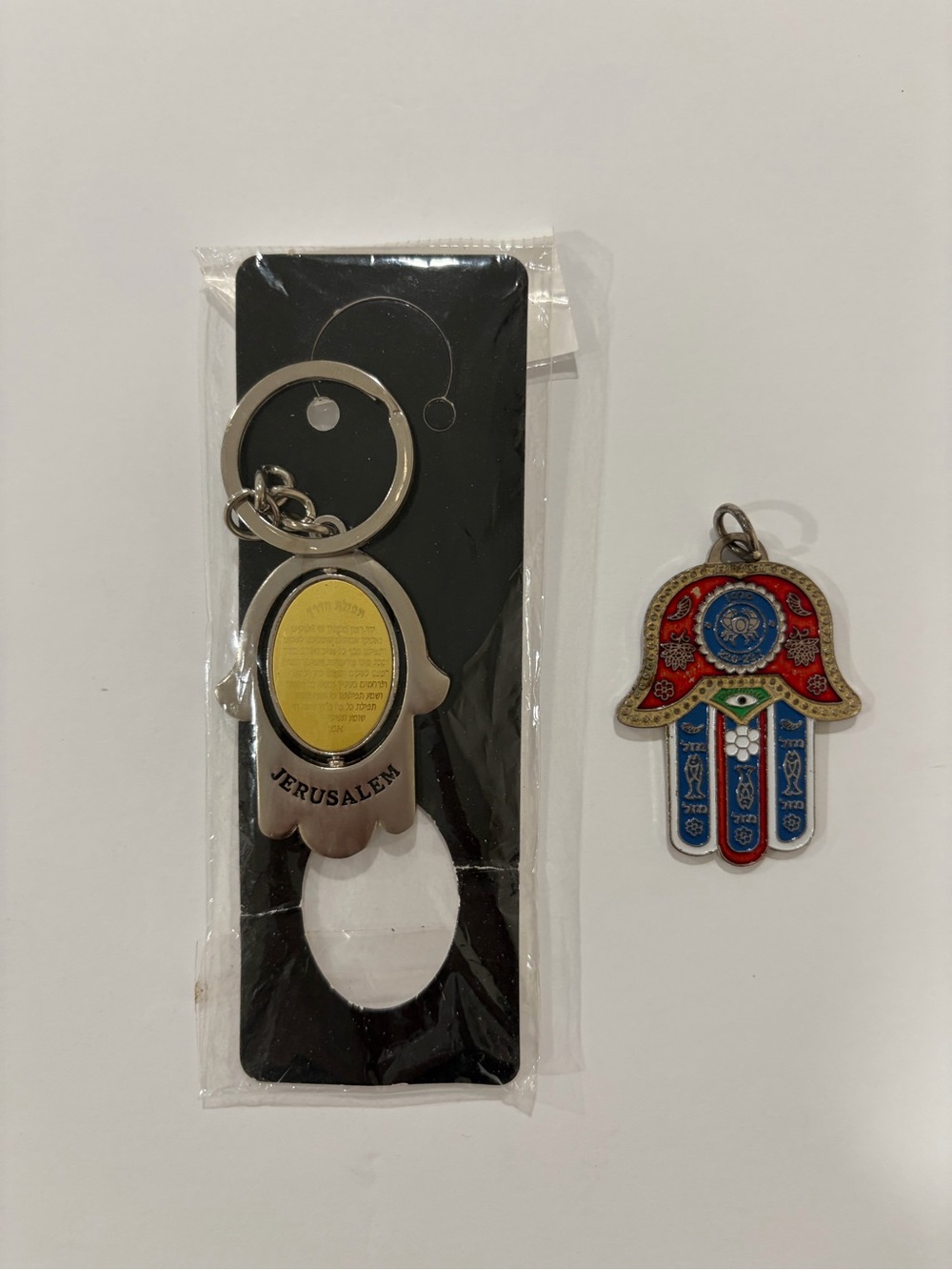 Jerusalem key chain with a Hamsa hand design with a Traveler's prayer.